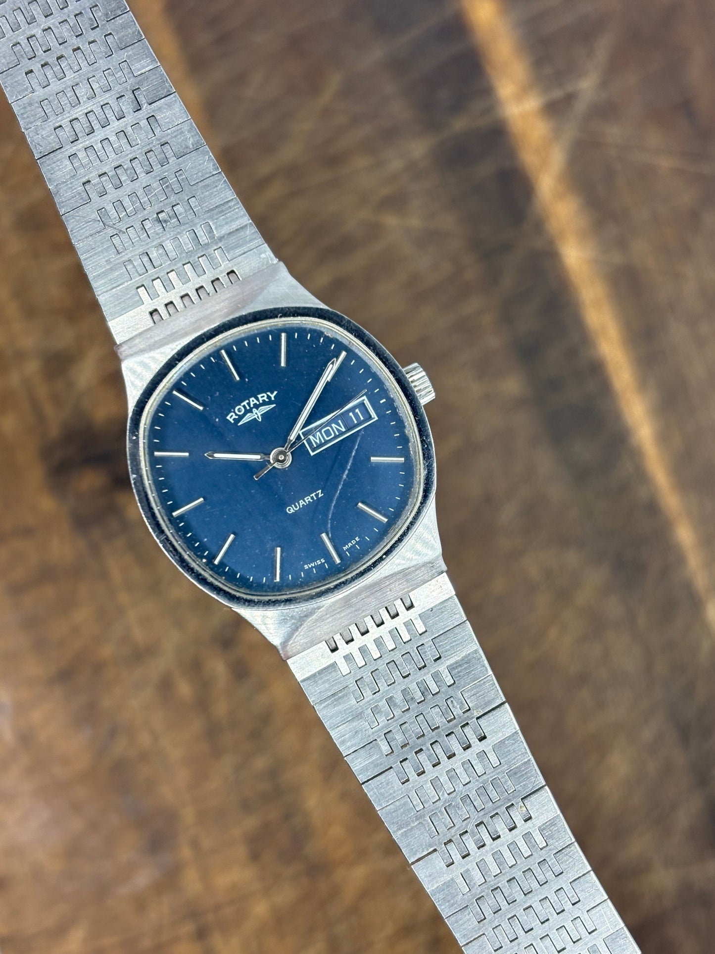 Rotary Quartz Day-Date Watch – Blue Dial, Integrated Bracelet, Swiss