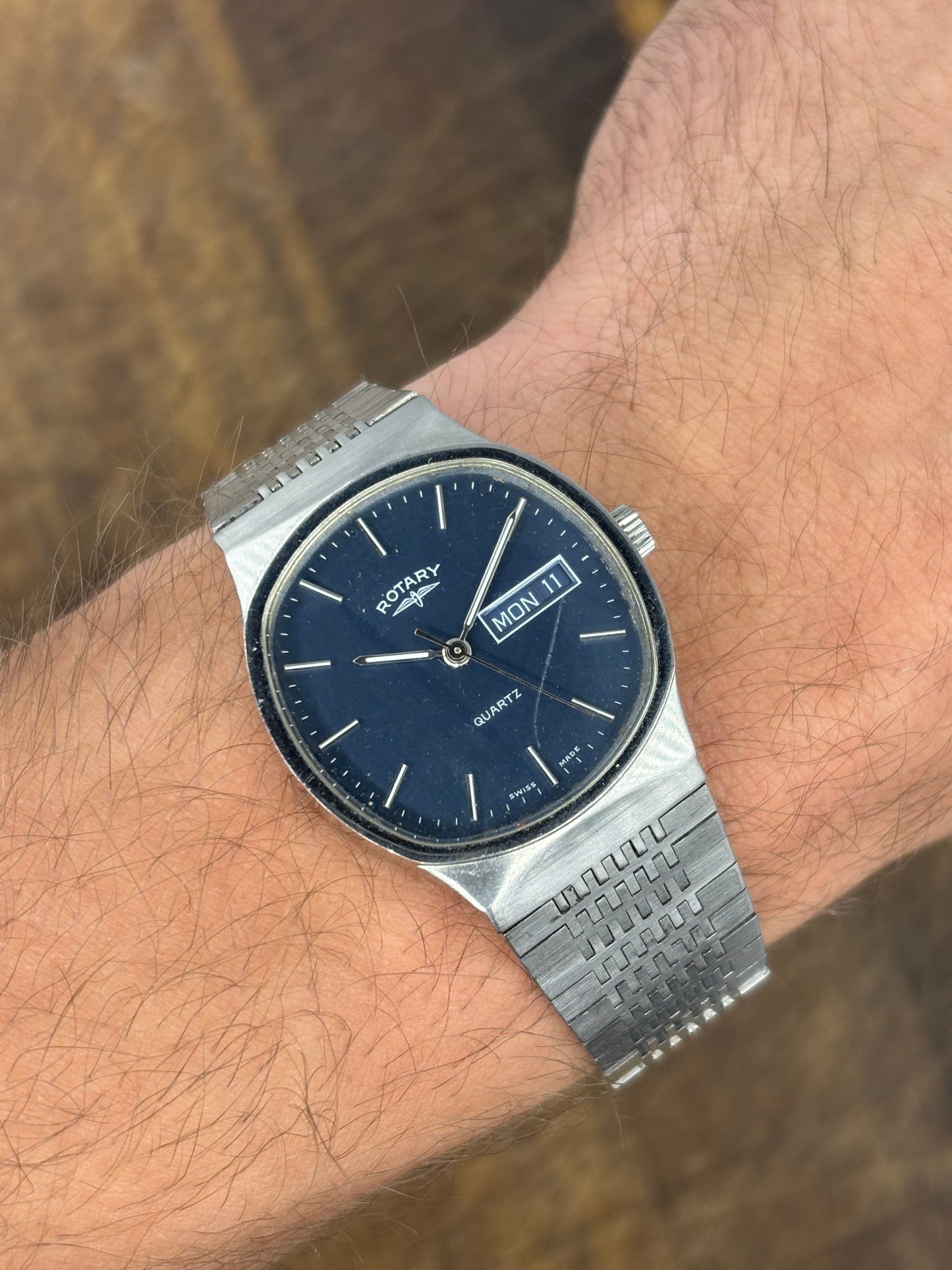 Rotary Quartz Day-Date Watch – Blue Dial, Integrated Bracelet, Swiss