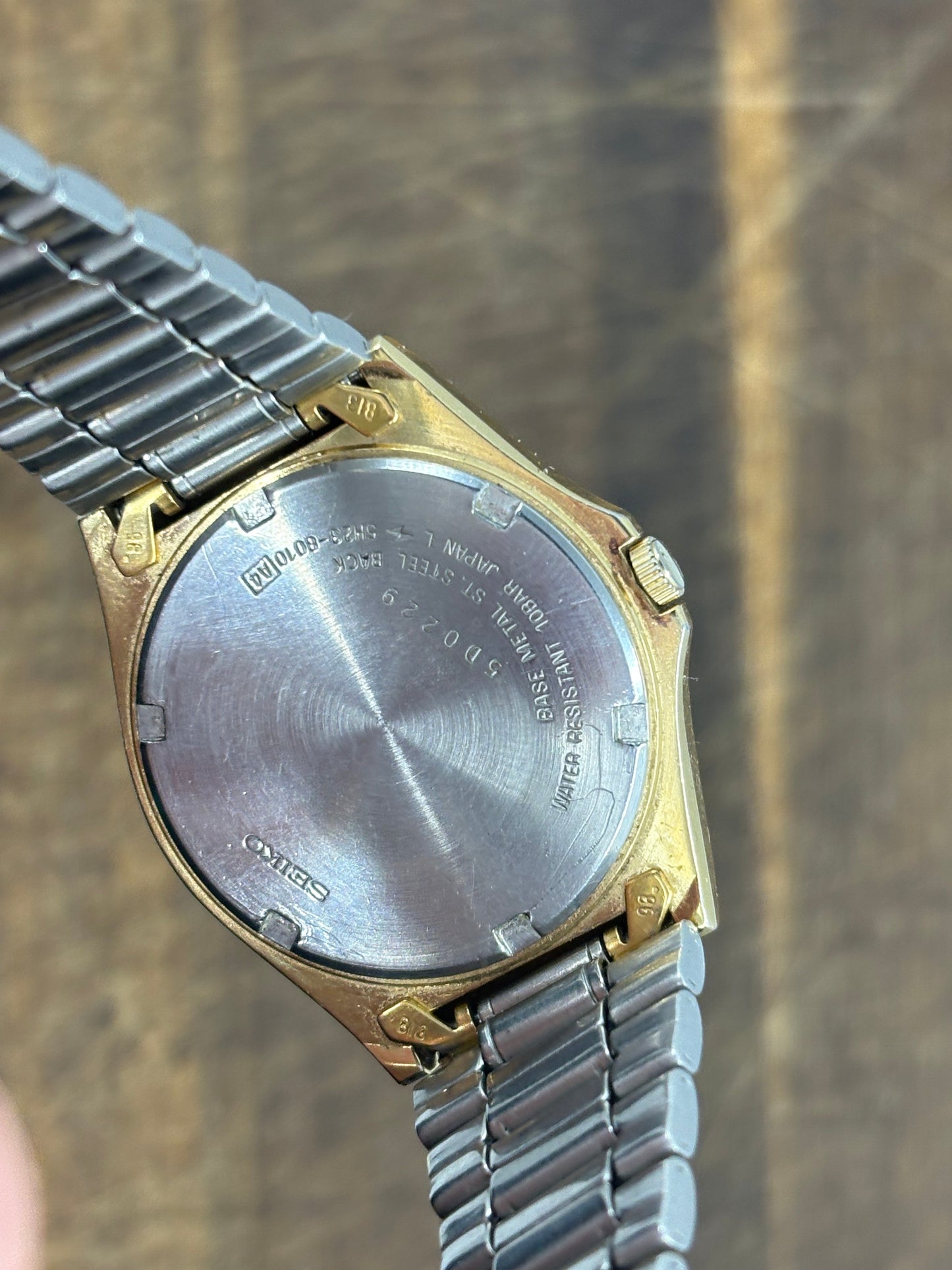 Seiko SQ100 Day-Date – Gold Dial & Bracelet