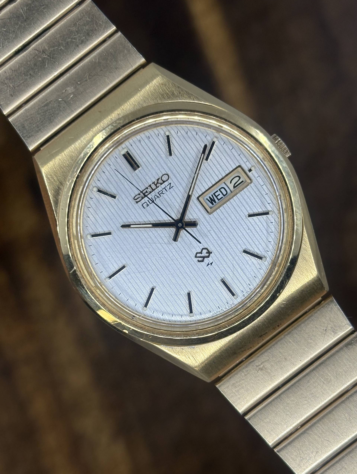 Vintage Seiko SQ Quartz Watch | Gold Tone White Textured Dial Day Date