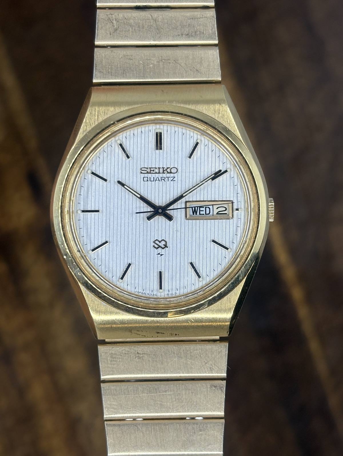 Vintage Seiko SQ Quartz Watch | Gold Tone White Textured Dial Day Date