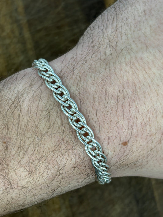 Woven solid silver bracelet