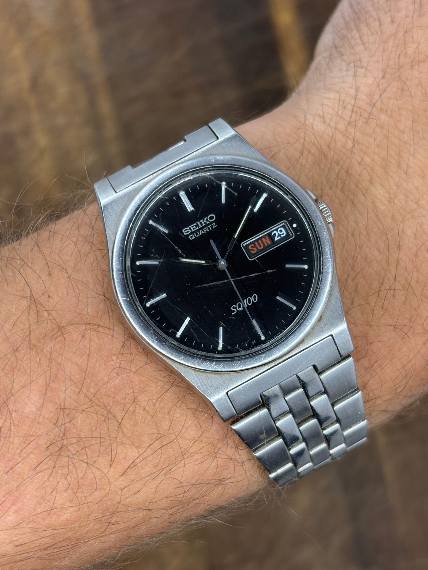 Seiko SQ100 Quartz | Black Dial | Day-Date | Stainless Steel | 1980s Vintage