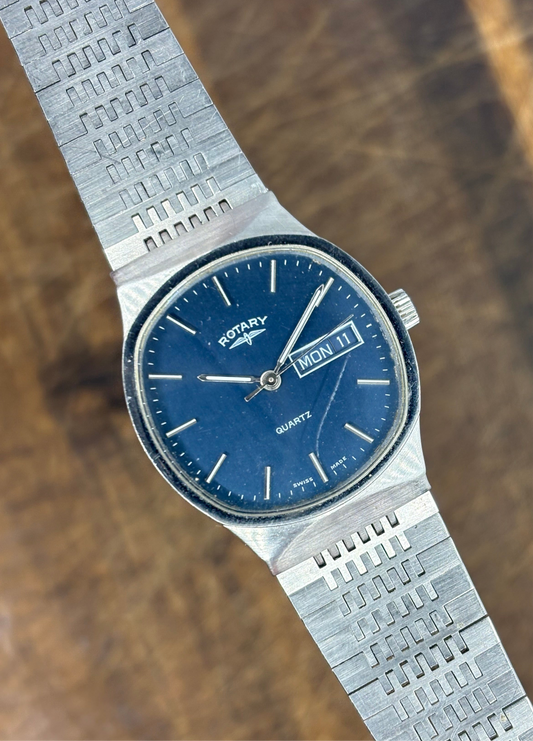 Rotary Quartz Day-Date Watch – Blue Dial, Integrated Bracelet, Swiss