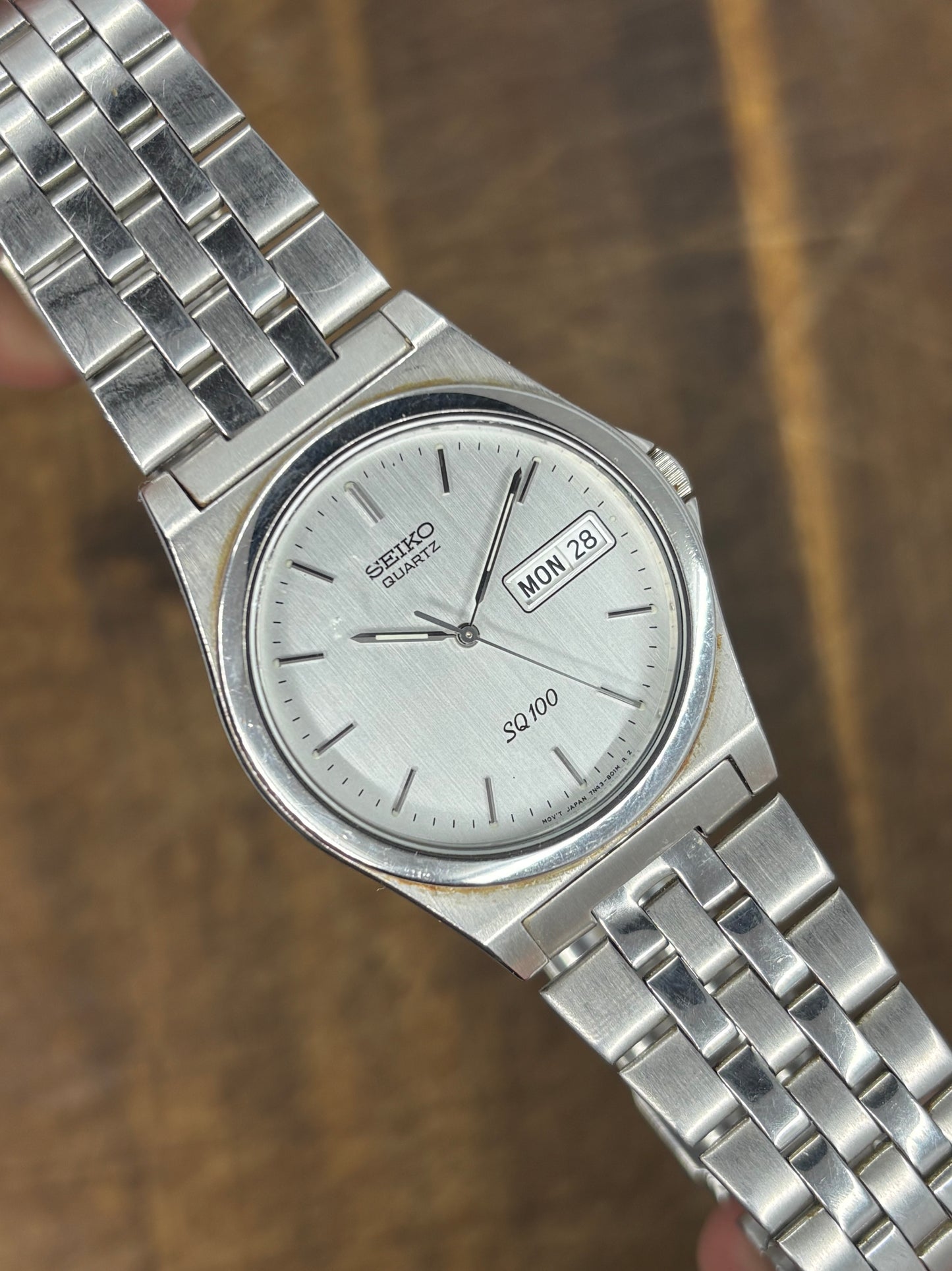 Seiko SQ100 Quartz | Silver Dial | Day-Date | Stainless Steel | 1980s Vintage
