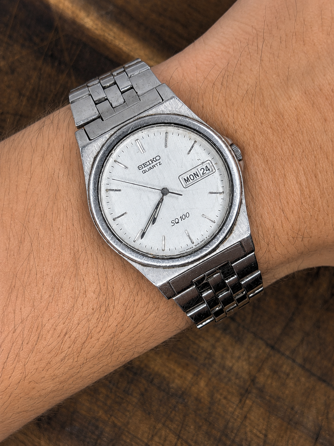 Vintage Seiko SQ100 Quartz Watch | Day-Date | Stainless Steel | Silver Dial | Japan