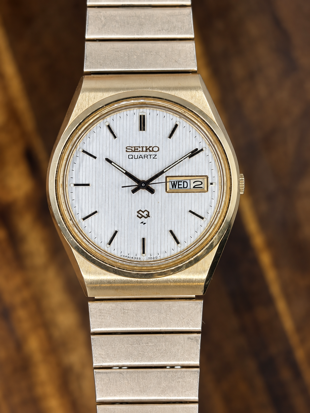 Vintage Seiko SQ Quartz Watch | Gold Tone White Textured Dial Day Date