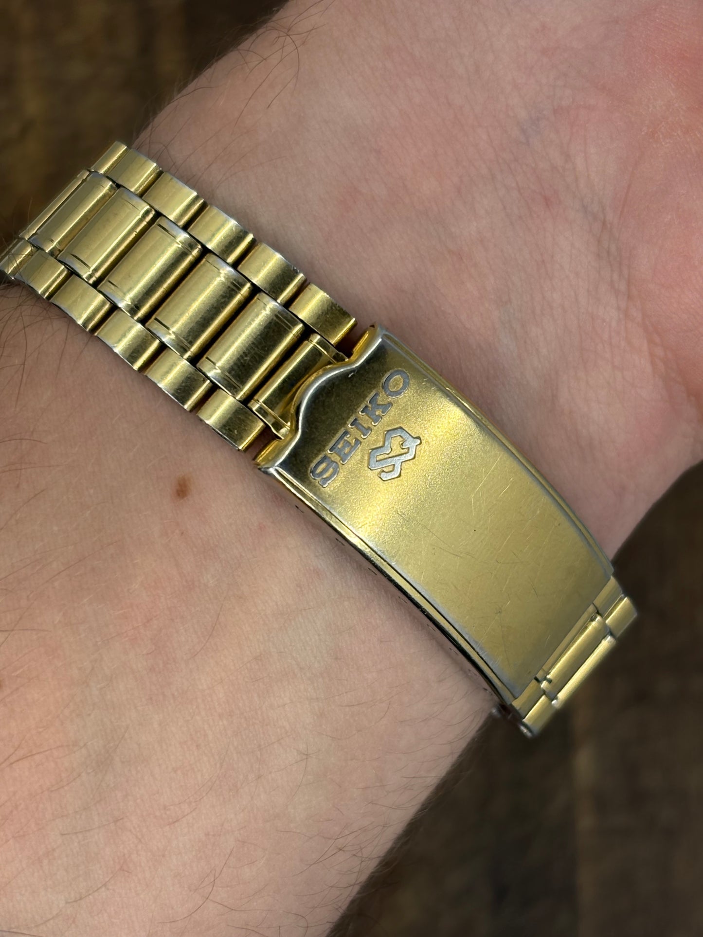 Seiko SQ100 Day-Date – Gold Dial & Bracelet