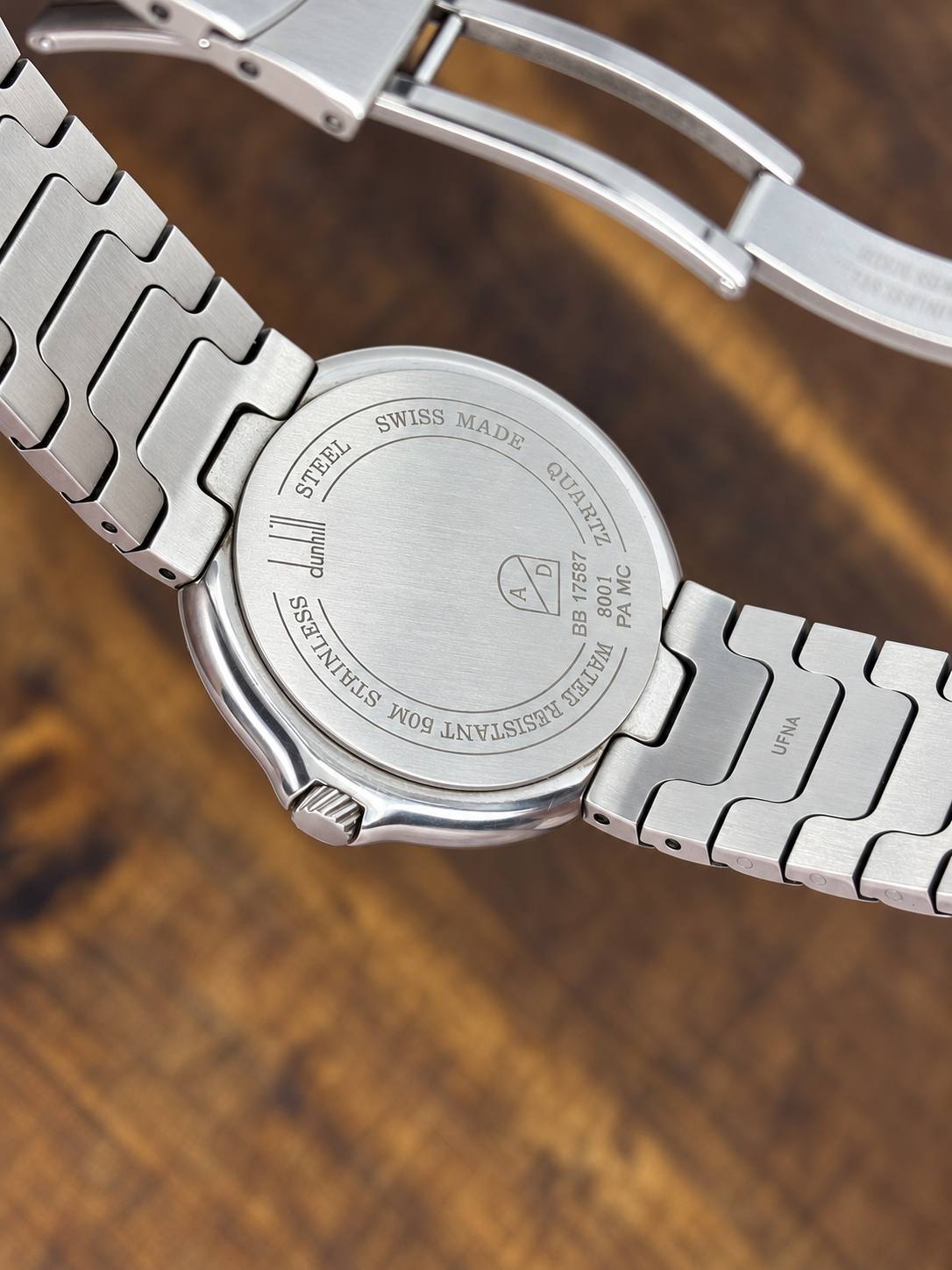 Vintage Dunhill Stainless Steel Watch – White Roman Numeral Dial – Integrated Silver-Tone Bracelet