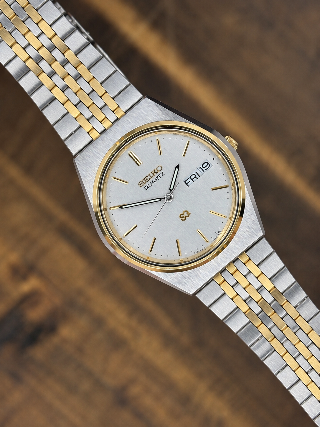 Vintage Seiko Quartz SQ watch with two-tone stainless steel & gold-tone case, silver dial and day-date display