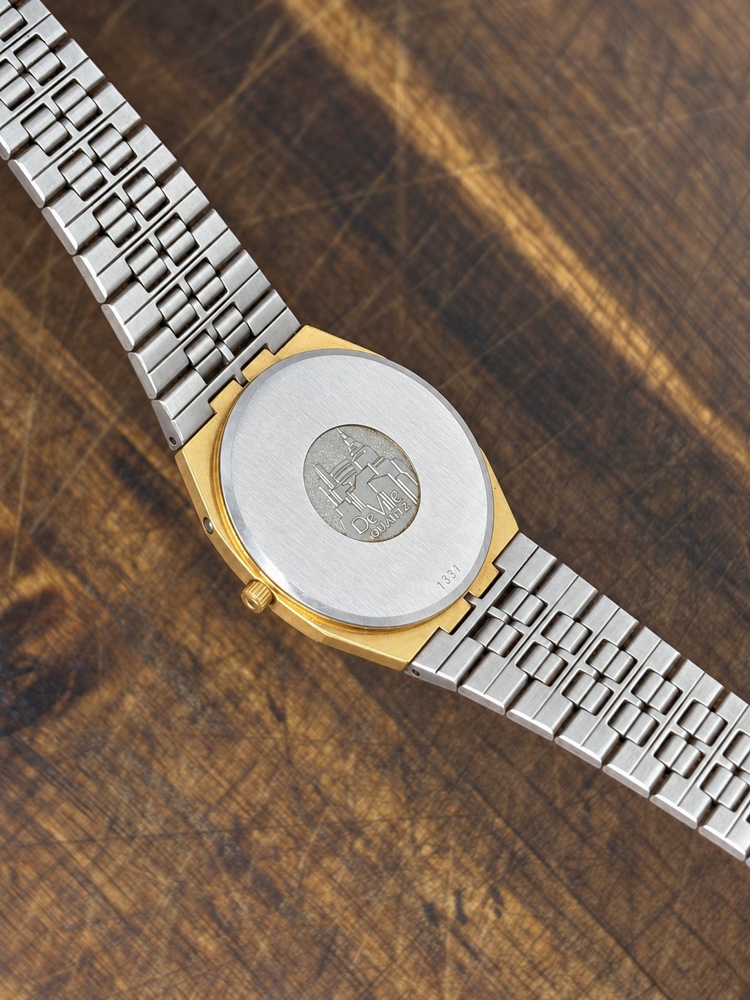 Vintage Omega De Ville Quartz Watch – Gold-Tone Octagonal Case – Champagne Dial – Integrated Gold-Tone Bracelet